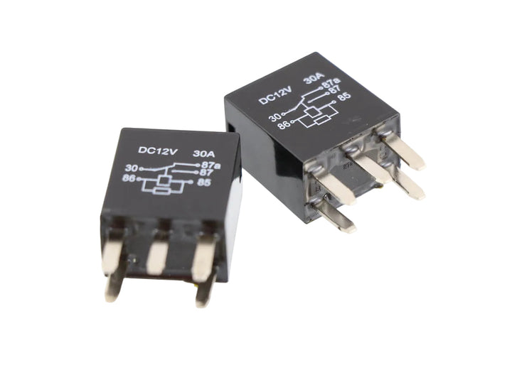 Advance Truck Parts USA 06-39201-001 heavy duty 5-pin relay showing a clean studio view of the wiring schematic on the housing and copper terminal pins on a plain white background