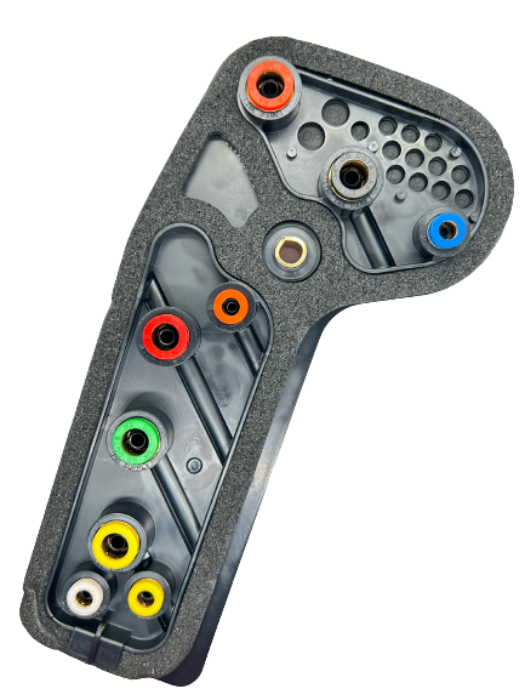 Advance Truck Parts USA 12-21425-002 Freightliner switch manifold showing a close-up studio perspective of the grey plastic body and multi-colored pneumatic ports