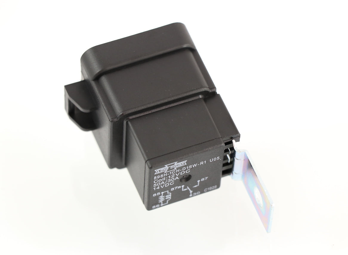 Advance Truck Parts USA 12077864 GM AC relay showing a clean studio view of the black housing, wiring diagram, metal mounting bracket, and blade terminals on a plain white background