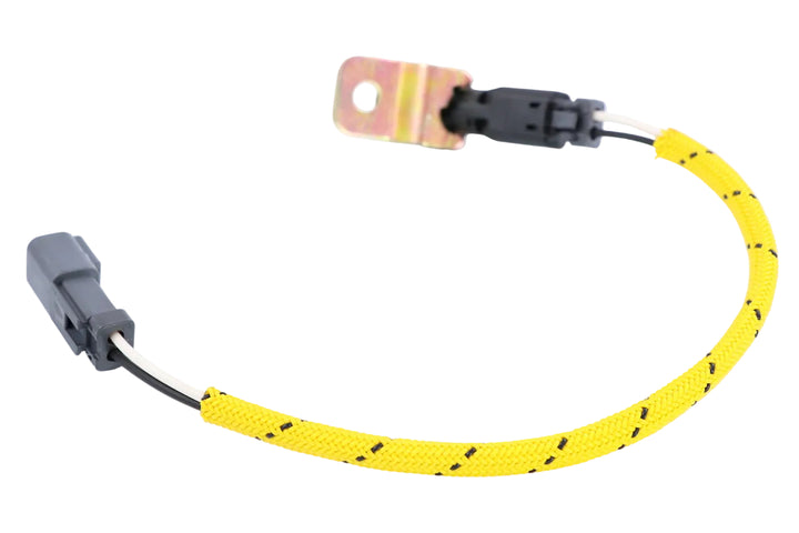 Advance Truck Parts USA 201-6615 Caterpillar speed sensor showing a clean studio view of the yellow braided wire loom, mounting bracket, and 2-pin connector on a plain white background