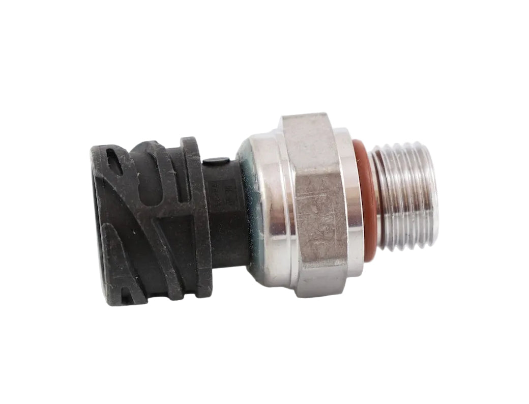 Advance Truck Parts USA 20796740 Mack Volvo pressure sensor showing a close-up studio perspective of the threaded metal base with O-ring and black connector housing