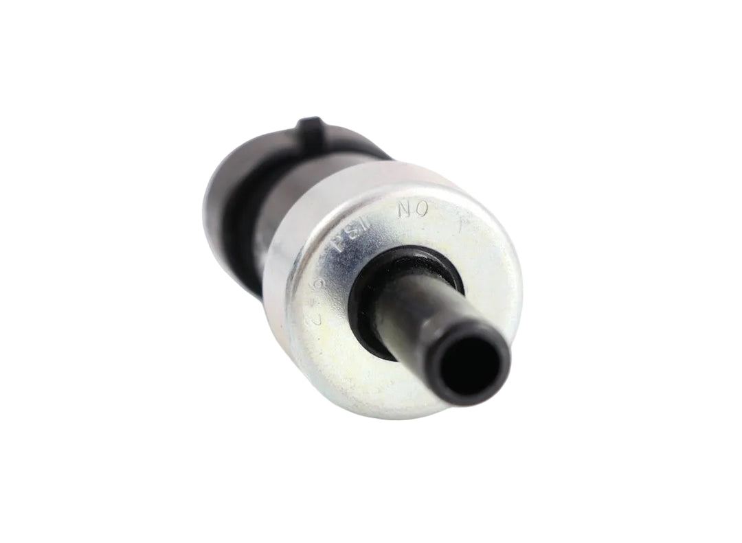 2505670C92 ATP pressure switch for Navistar International trucks showing a clean angled studio view of the metallic port, stamped markings, and black housing on a plain white background