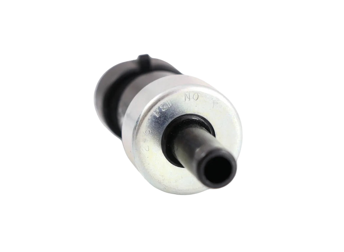2505670C92 ATP pressure switch for Navistar International trucks showing a clean angled studio view of the metallic port, stamped markings, and black housing on a plain white background