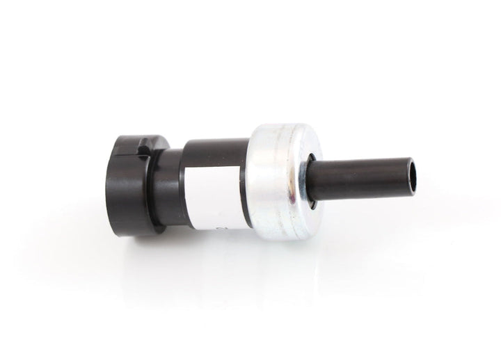 Advance Truck Parts USA 2505850C1 Navistar International pressure switch showing a close-up studio perspective of the black connector housing, metal collar, and stem fitting
