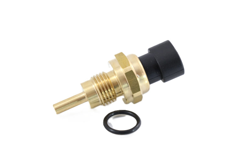 Advance Truck Parts USA 3865312 and 3081311 Cummins temperature sensor showing a clean studio view of the brass threaded probe, o-ring seal, and electrical connector on a plain white background