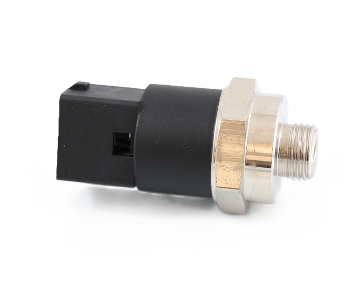 Advance Truck Parts USA 3962893 Volvo oil pressure sensor showing a clean studio view of the threaded metal fitting, hex nut, and black square connector housing on a plain white background