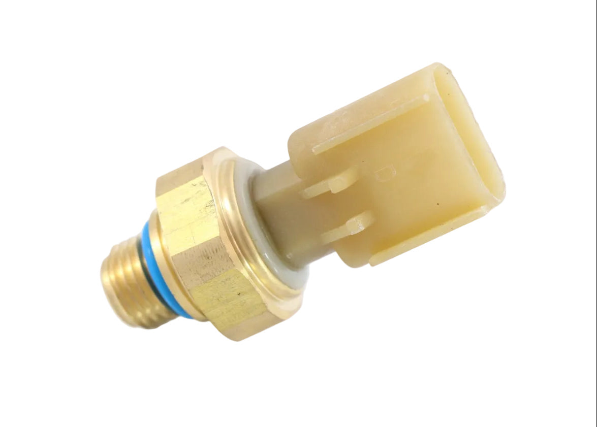 Advance Truck Parts USA 4087987 Cummins engine pressure sensor featuring threaded brass port, blue o-ring seal, hex mounting collar, and tan polymer connector housing