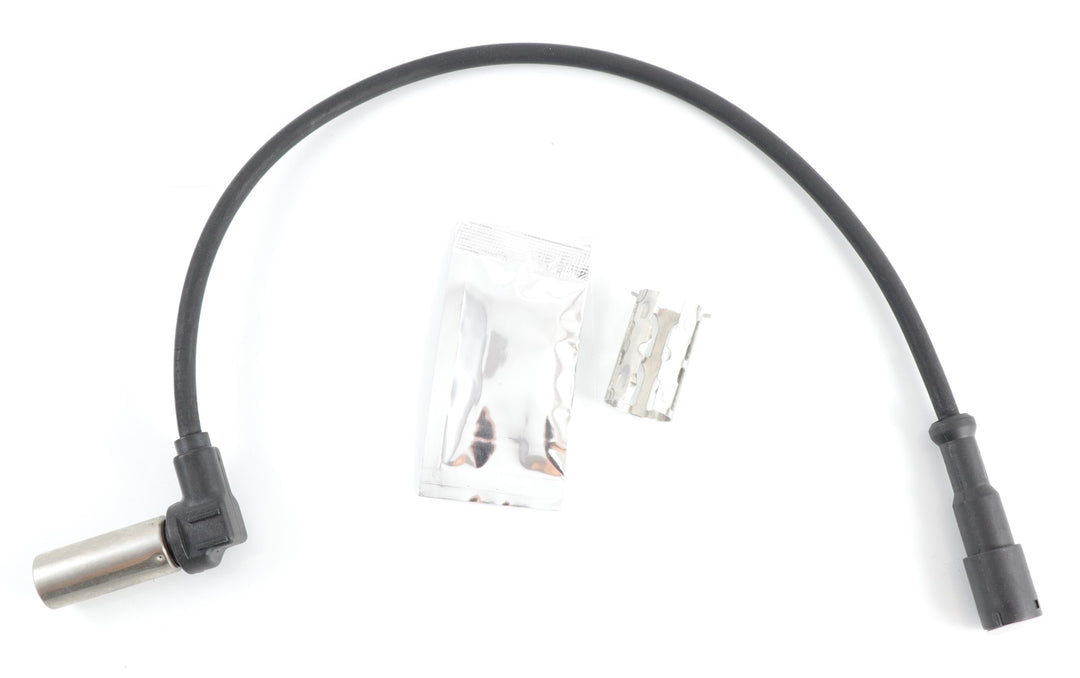 Advance Truck Parts USA 4410329212 ABS sensor kit showing a close-up studio perspective of the sensor probe, wiring harness, dielectric grease packet, and installation clip