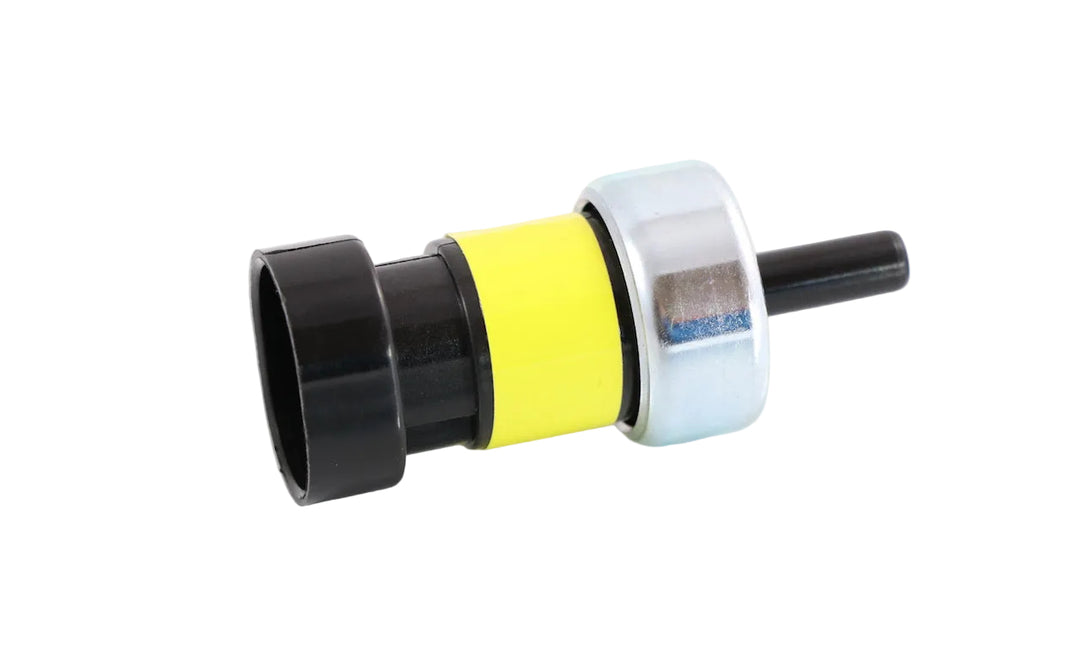 Advance Truck Parts USA 4C4Z2B339CA International and Navistar brake cruise low pressure switch showing a close-up studio perspective of the black connector housing, yellow label, and metal base fitting