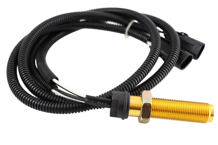 Advance Truck Parts USA 64MT339M threaded 3/4-16 brass speed sensor featuring 4-wire corrugated harness wrap and 2 electrical connector plugs