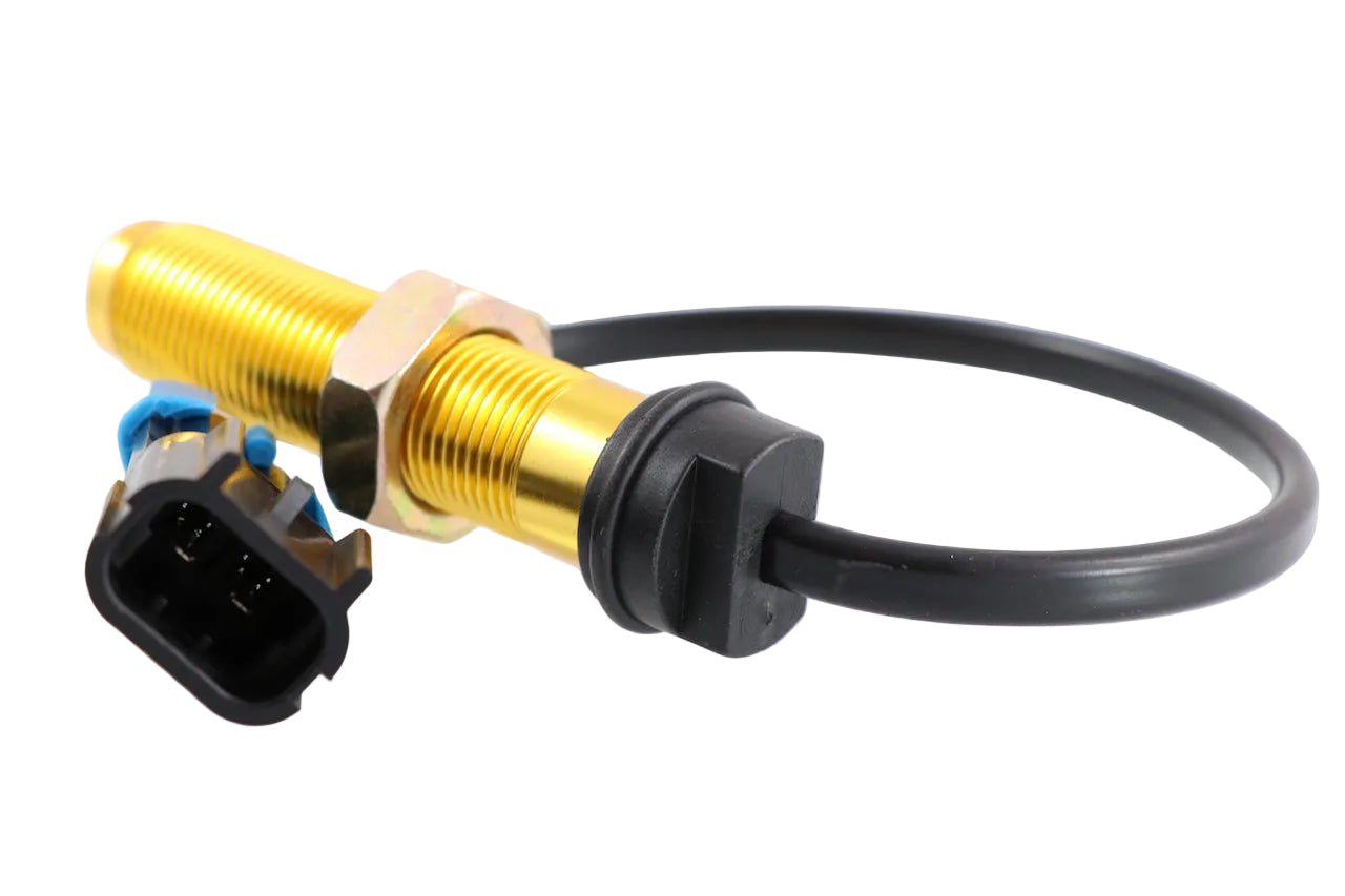 Advance Truck Parts USA 64MT435M Caterpillar truck speed sensor showing a clean studio view of the threaded brass body, mounting nut, and connected wiring harness on a plain white background