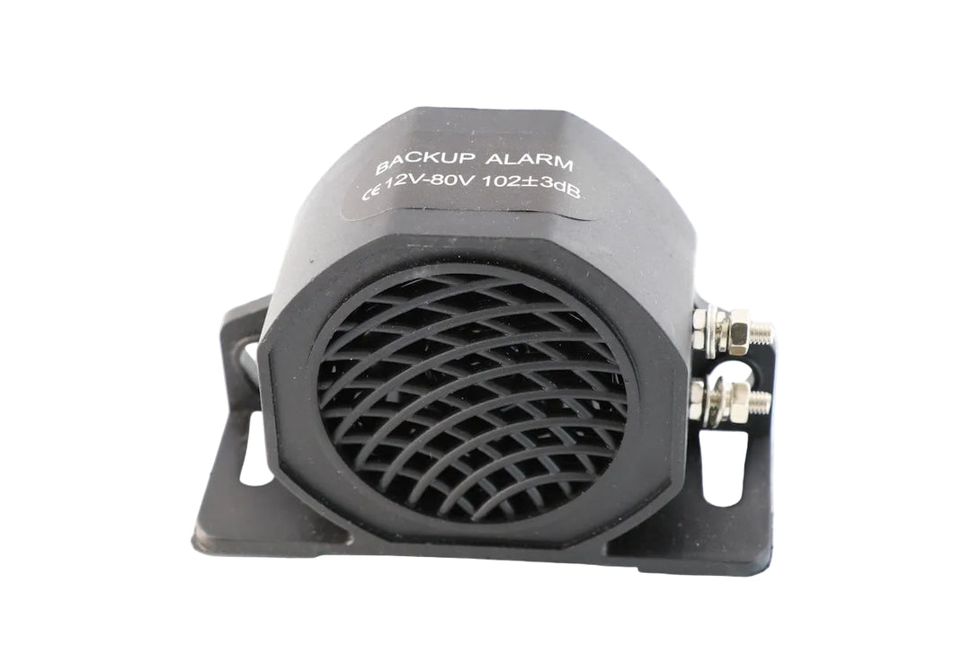 Advance Truck Parts USA W091053 commercial heavy-duty backup alarm showing a clean front studio view of the black speaker grille and mounting bracket 