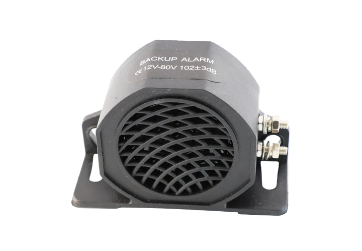 Advance Truck Parts USA W091053 commercial heavy-duty backup alarm showing a clean front studio view of the black speaker grille and mounting bracket 