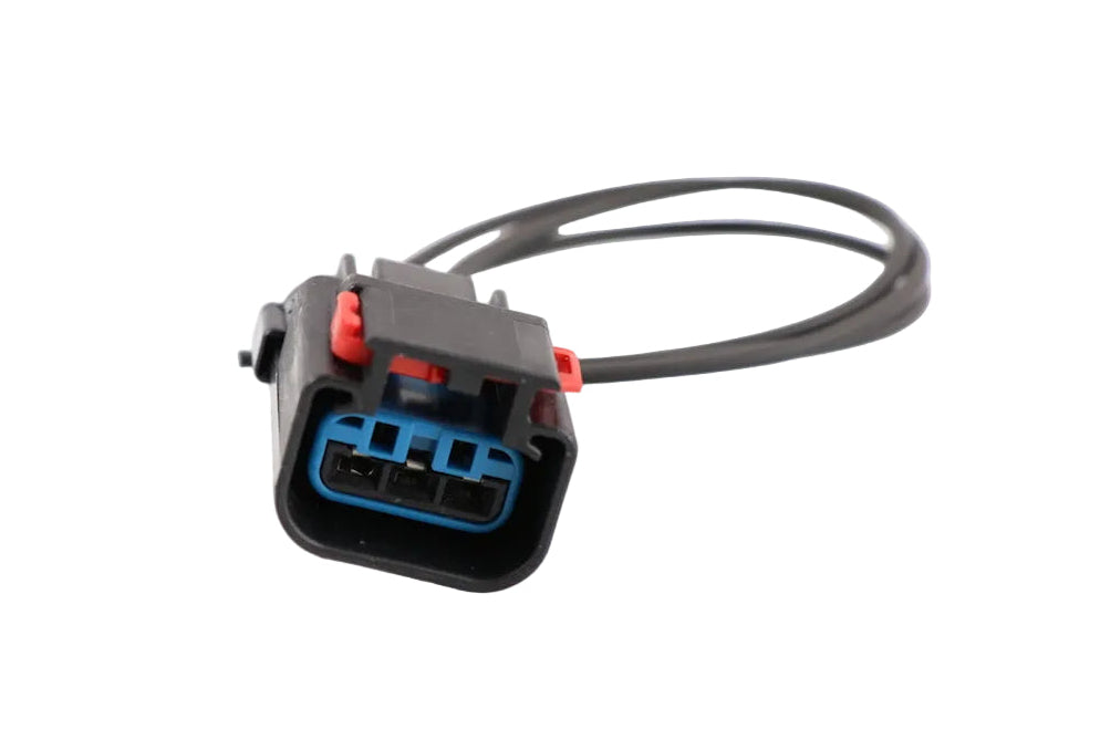Advance Truck Parts USA W094100 Cummins ISX oil pressure harness connector showing a clean studio view of the 3-blade housing, red lock tab, blue seal, and pigtail wires on a plain white background