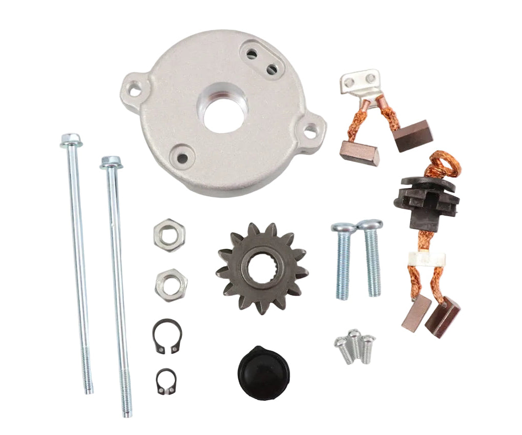 Advance Truck Parts USA WRK1100 Denso PMGR starter repair kit showing a clean studio view of the back cover, drive gear, brushes, hardware screws, and snap rings
