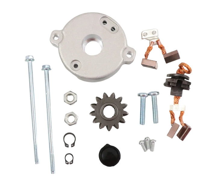Advance Truck Parts USA WRK1100 Denso PMGR starter repair kit showing a clean studio view of the back cover, drive gear, brushes, hardware screws, and snap rings