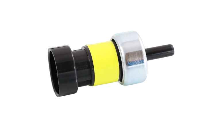 Advance Truck Parts USA 1749-9132 pressure switch for Peterbilt and Kenworth trucks featuring a yellow body section and metal casing on a plain background