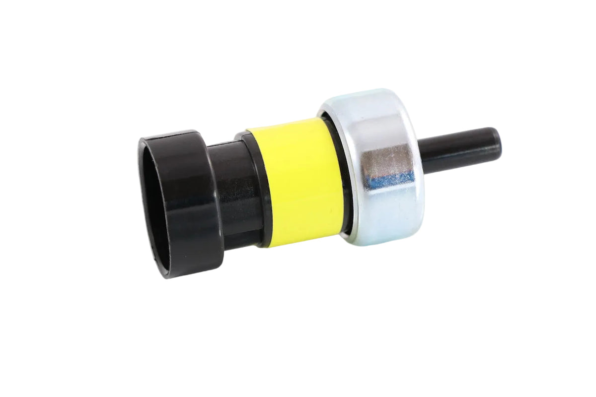 Advance Truck Parts USA 2042478C2 low pressure switch for Navistar International trucks featuring a yellow label and metal housing on a plain background