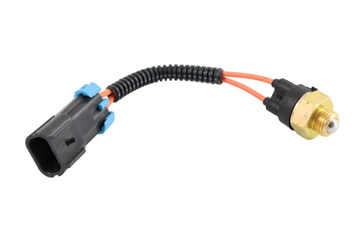 Advance Truck Parts USA 21-467P reverse back-up normally open ball switch showing a horizontal profile of the brass threaded base with a metal ball bearing, orange wiring with black protective conduit, and a black 2-pin electrical connector on a plain white background