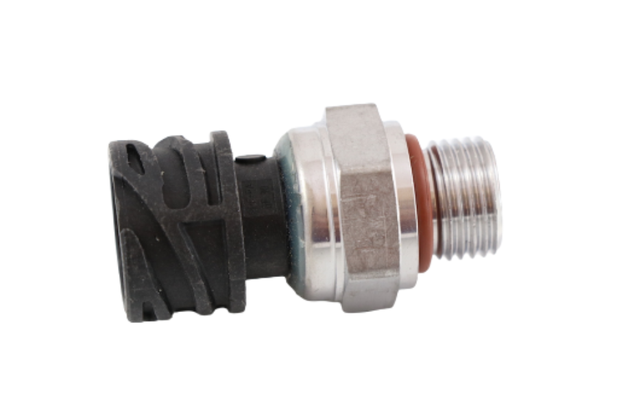 Advance Truck Parts USA 22899626 pressure sensor for Mack and Volvo trucks showing a horizontal profile of the metallic hex body, threaded M16 x 1.5 port with an orange O-ring, and black circular 4-pin connector housing on a plain white background