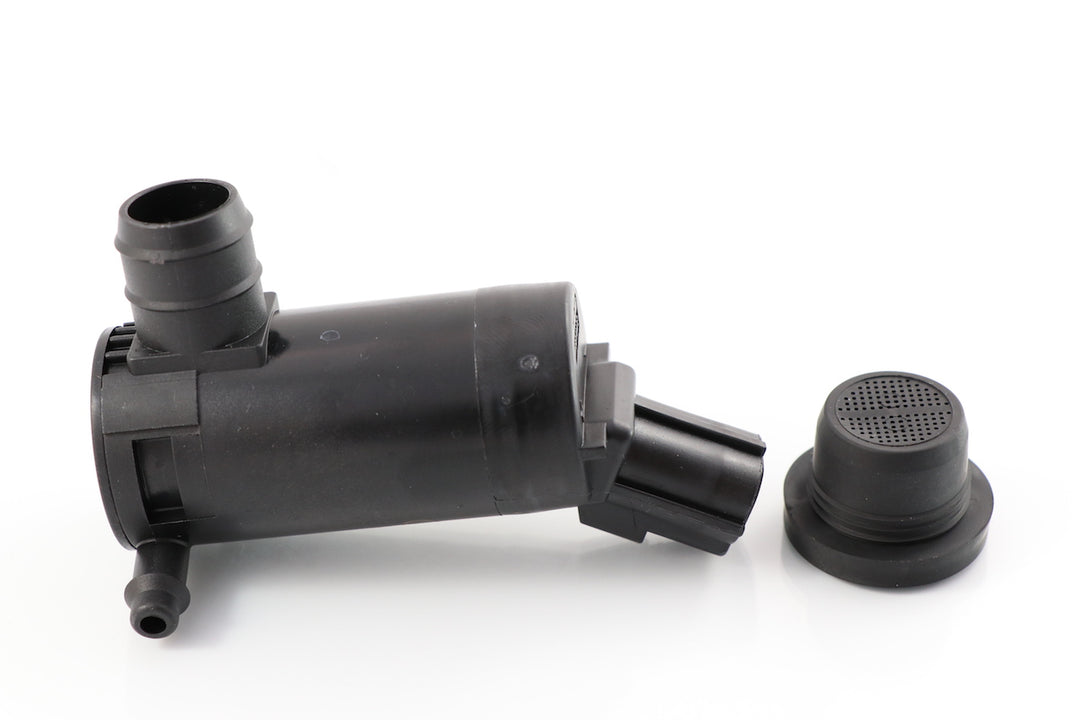 Advance Truck Parts USA A22-53729-000 windshield washer pump for Freightliner trucks showing an angled studio view of the black plastic pump body, fluid nozzles, 2-pin connector, and rubber screen grommet 
