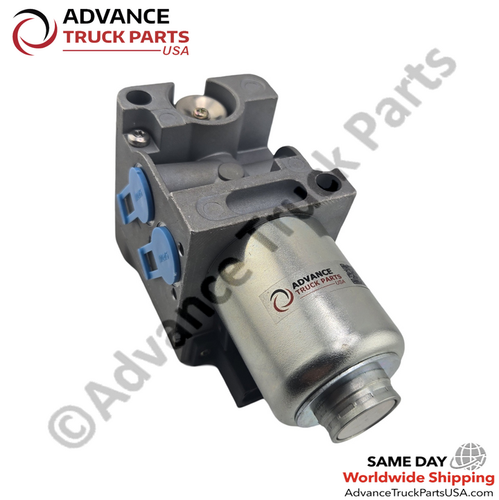 Advance Truck Parts USA Freightliner VPOD control valve featuring an angled perspective of the blue protective caps securing the threaded inlet and exhaust ports on the grey manifold