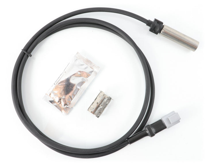 Advance Truck Parts USA 801553 801175 straight ABS sensor kit featuring a 43-inch sensor cable, dielectric grease packet, and metal mounting clip on a plain background
