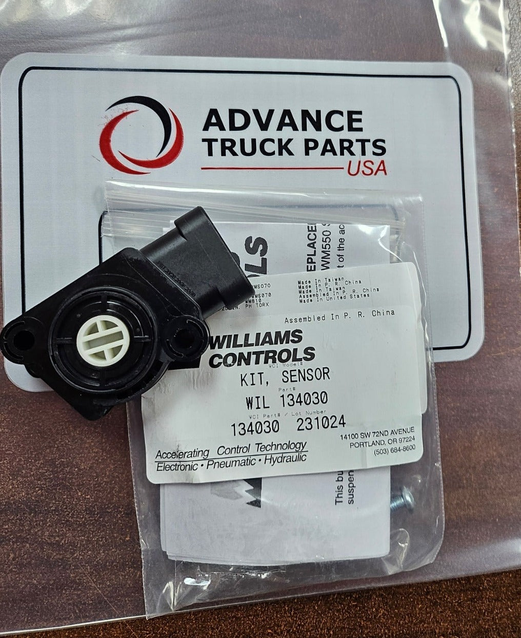 Genuine Williams 134030 throttle position sensor kit including sensor, hardware, instructions, and original packaging on an Advance Truck Parts branded background
