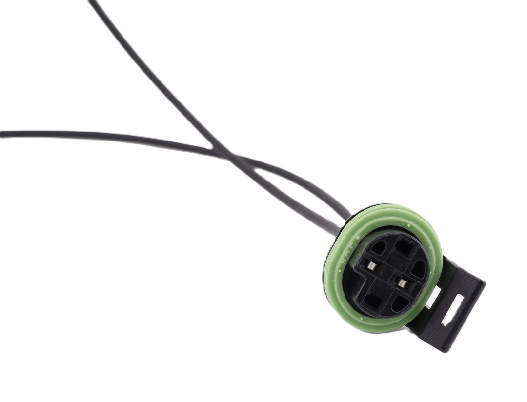 Advance Truck Parts USA W094105 pressure switch pigtail connector showing a close-up perspective of the black 2-pin connector face, green seal, and black wires 