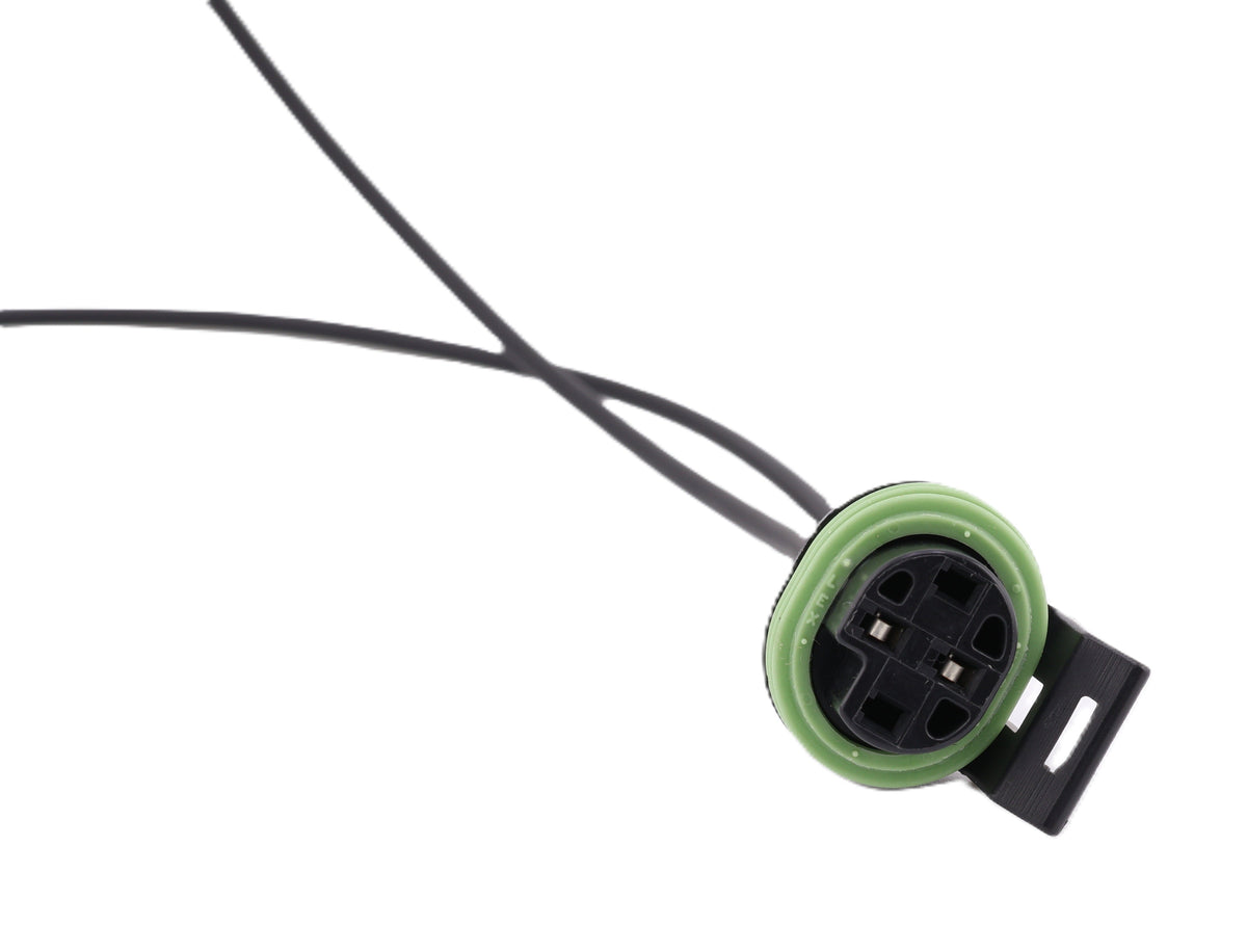 Advance Truck Parts USA W094105 pressure switch pigtail connector showing a close-up perspective of the black 2-pin connector face, green seal, and black wires 