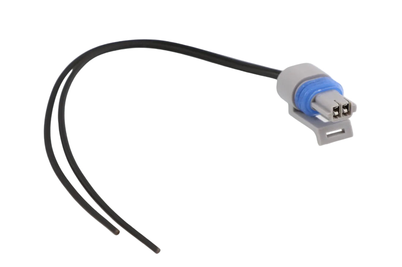 Advance Truck Parts USA W094106 2-pin pigtail connector featuring a gray housing, blue seal, and lead wires on a plain background