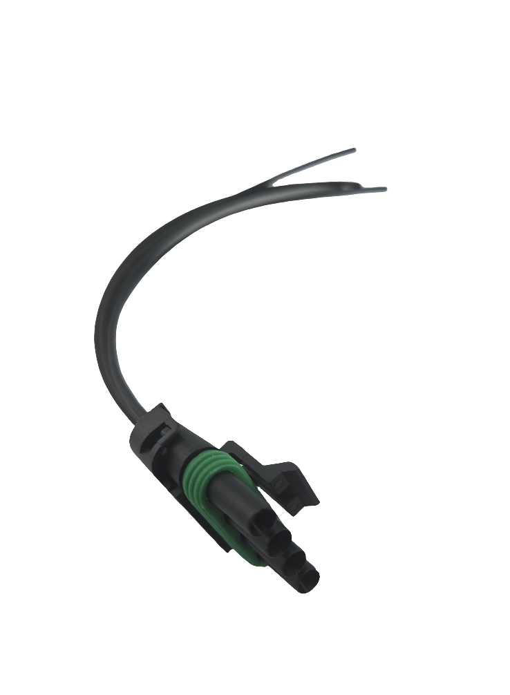 Advance Truck Parts USA W094269 4-pin pigtail connector showing an angled profile of the black plastic housing, green ribbed weather seal, locking tab mechanism, and 10-inch 18 AWG black wire leads on a plain white background