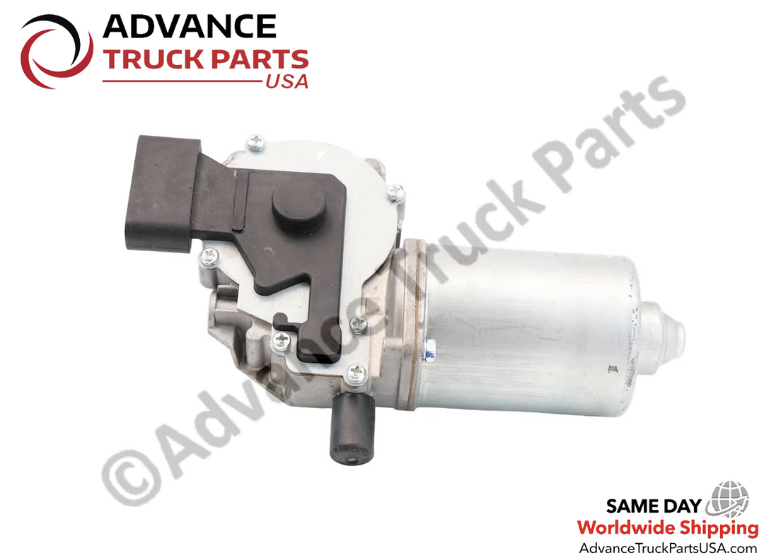 Advance Truck Parts USA International wiper motor featuring a bottom-up view of the flat black plastic gear cover plate secured to the cast aluminum gear housing alongside the silver motor cylinder