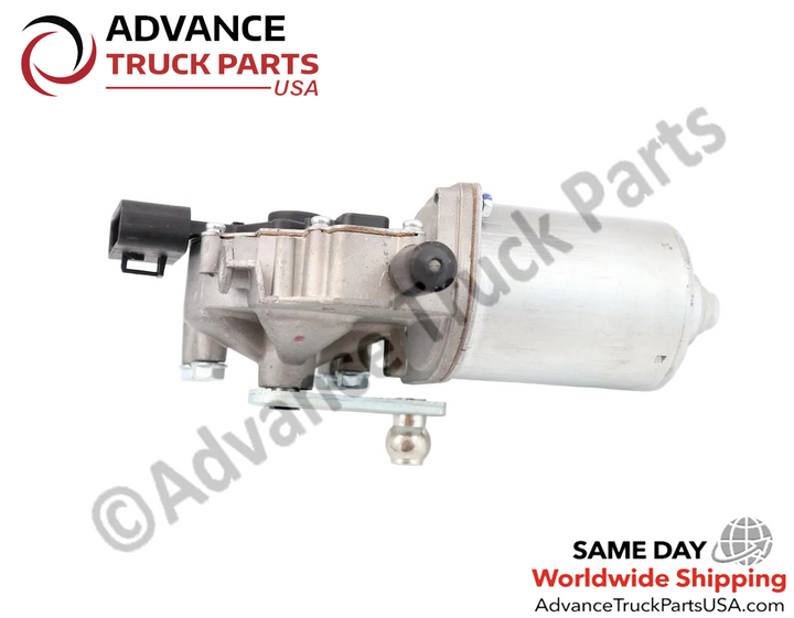 Advance Truck Parts USA International wiper motor displaying a reverse horizontal side profile highlighting the lower ball-joint linkage arm, cast mounting points, and cylindrical motor casing