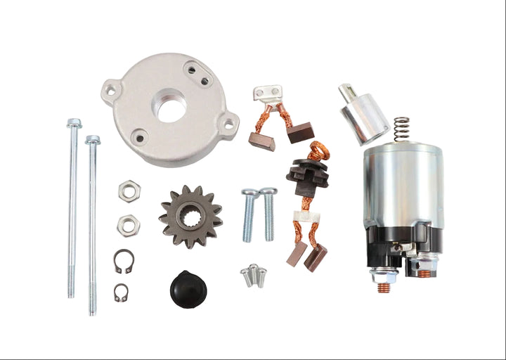 Advance Truck Parts USA WRK1100 PMGR starter repair kit with solenoid for Toyota showing an overhead layout of the replacement back cover, starter drive gear, solenoid, brushes, and hardware on a plain white background