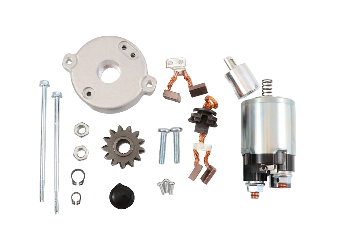Advance Truck Parts USA 28100-28041 Toyota PMGR starter repair kit showing a clean studio view of the solenoid, drive gear, brushes, cover, and hardware components on a plain white background