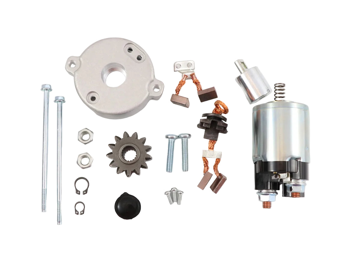 Advance Truck Parts USA 28100-28041 Toyota PMGR starter repair kit showing a clean studio view of the solenoid, drive gear, brushes, cover, and hardware components on a plain white background
