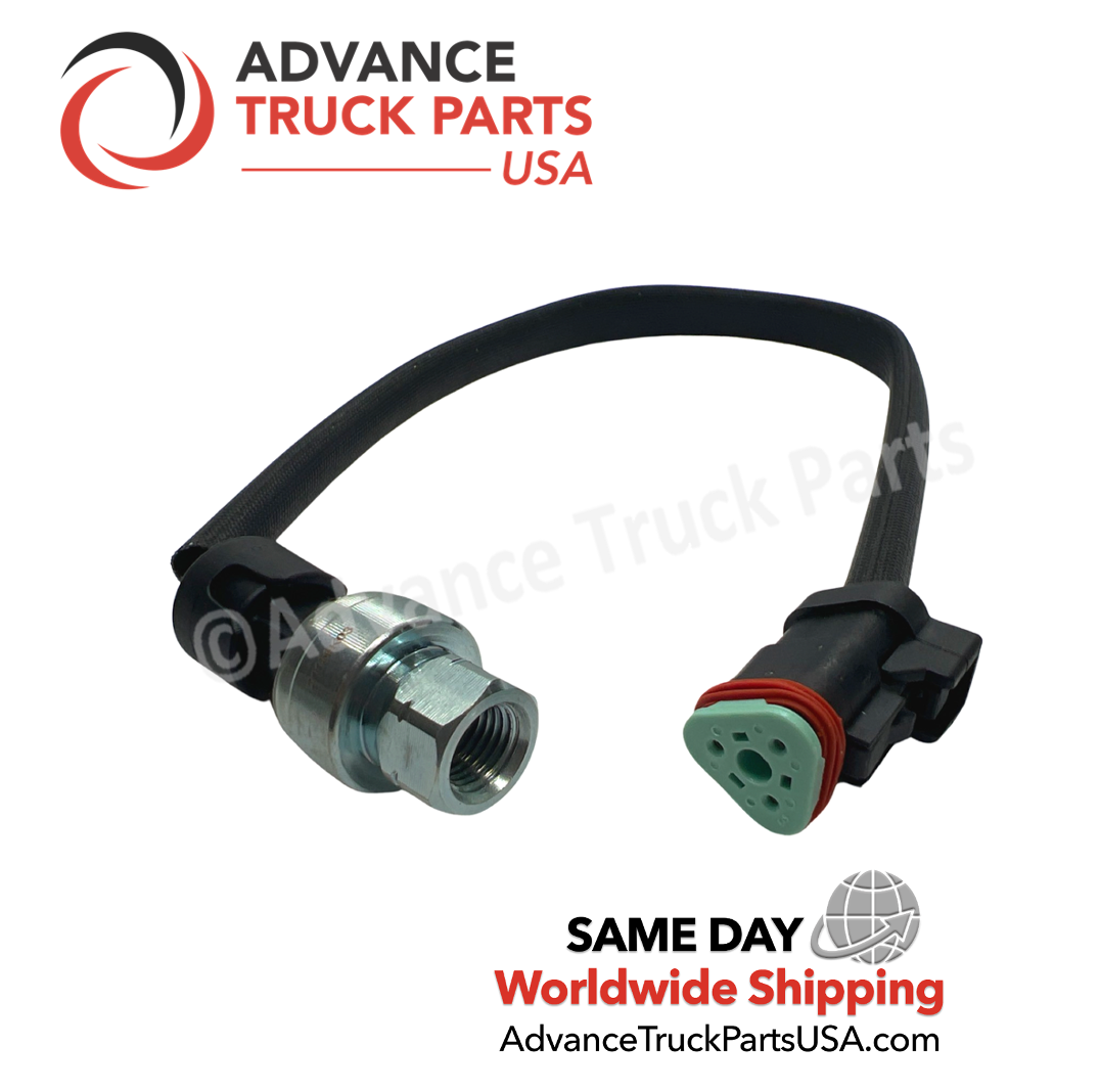 Advance Truck Parts USA branded studio angled perspective showcasing the heavy-duty Caterpillar pressure sensor highlighting the threaded internal port, protective black wiring sleeve, and triangular connector plug