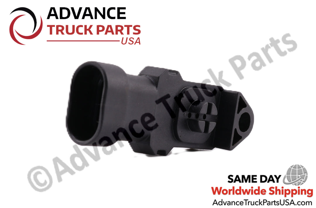 Advance Truck Parts USA branded studio angled perspective showcasing the black plastic body, mounting hole, and locking tab of the heavy-duty ambient air sensor for Cummins engines