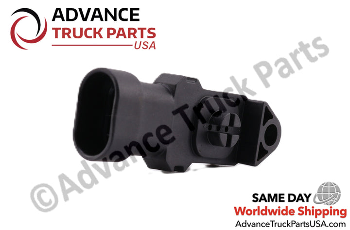 Advance Truck Parts USA branded studio angled perspective from the connector end highlighting the oval housing, black plastic body, and side profile of the heavy-duty ambient air temperature sensor