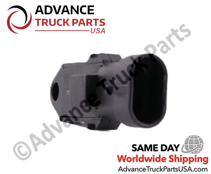 Advance Truck Parts USA branded studio angled perspective from the rear connector end highlighting the oval housing, black plastic body, and side profile of the heavy-duty ambient air temperature sensor for Cummins engines