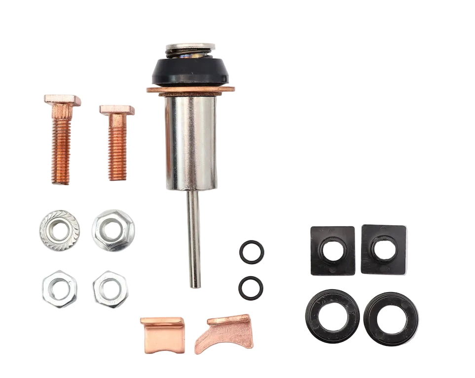 Advance Truck Parts Denso starter repair kit showing a clean studio view of the plunger, copper contacts, terminal bolts, nuts, O-rings, and square gaskets