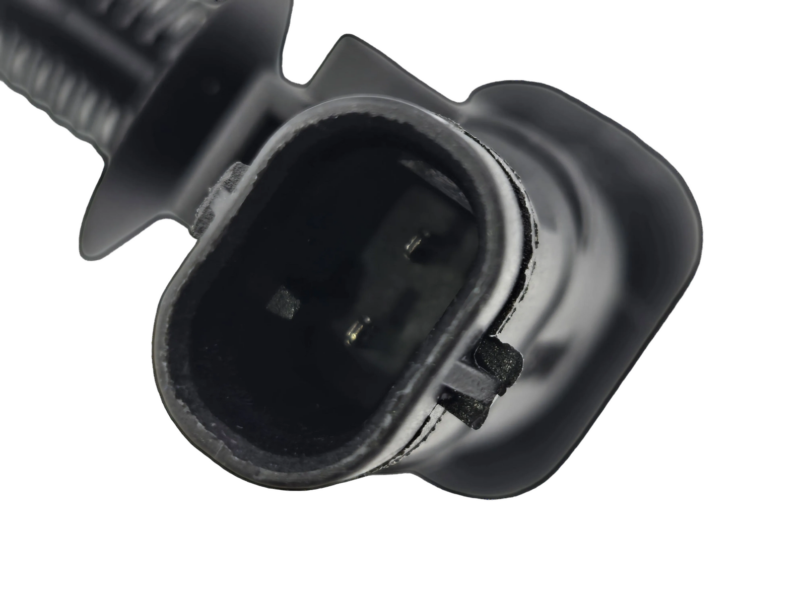 Plain background close-up view highlighting the 2 electrical terminal pins inside the connector housing of the turbocharger speed sensor