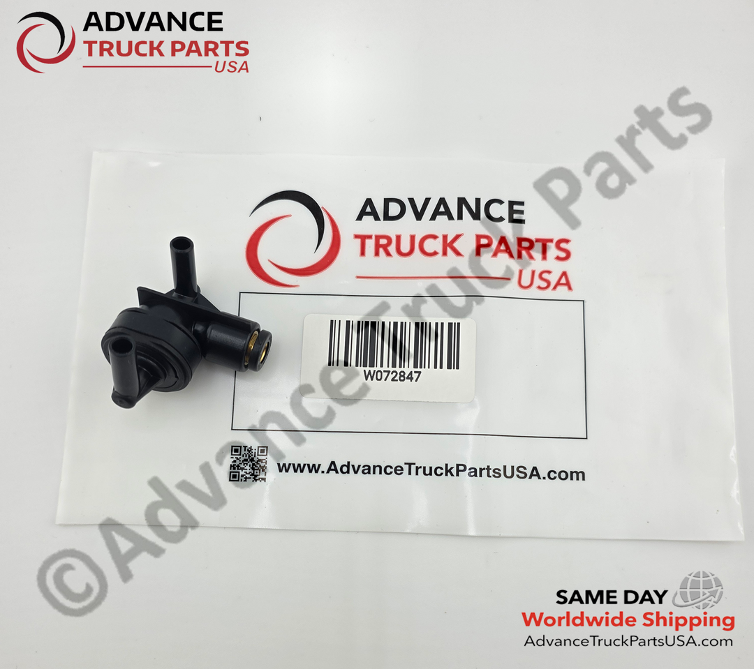 Advance Truck Parts USA branded studio overhead perspective showing the air supply shuttle valve unboxed alongside its clear plastic packaging bag featuring a printed barcode and part number label
