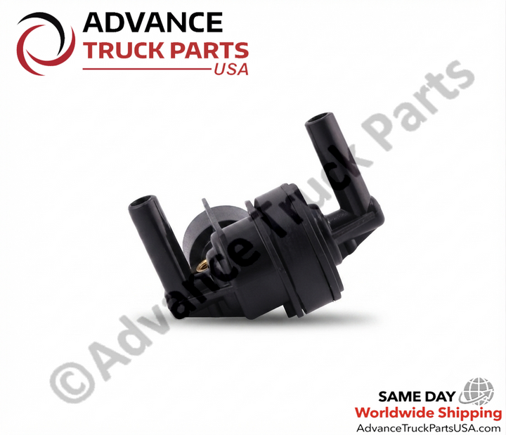 Advance Truck Parts USA branded studio horizontal perspective showcasing the heavy-duty double check air supply shuttle valve featuring a black leak-resistant housing and two pneumatic tube extensions for International Navistar commercial trucks