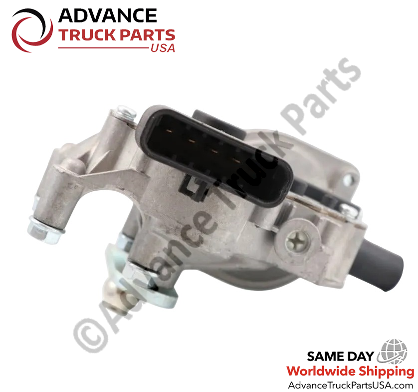 Advance Truck Parts USA International wiper motor featuring a close-up angled view of the multi-pin black electrical receptacle extending from the cast aluminum gear housing