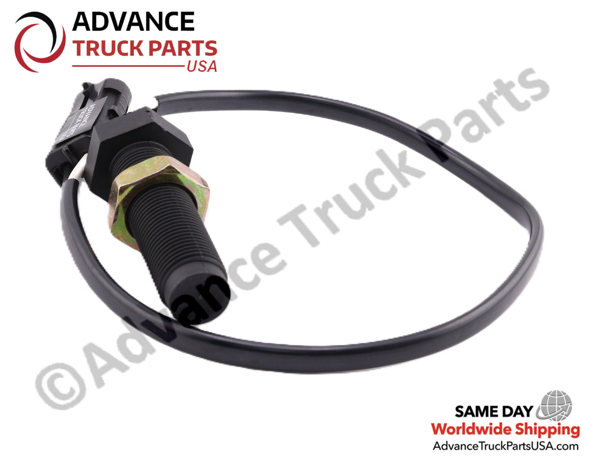 Advance Truck Parts USA studio angled perspective of the heavy-duty speedometer speed sensor highlighting the black threaded body and coiled wiring harness for Navistar, Mack, Volvo, Peterbilt, and Kenworth commercial trucks