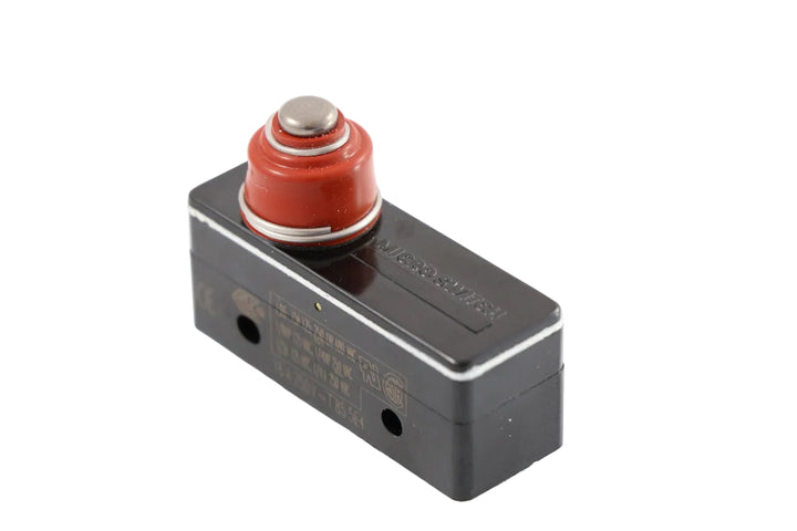 Advance Truck Parts USA P1218 Jake Brake micro-switch with red rubber boot plunger on a plain background