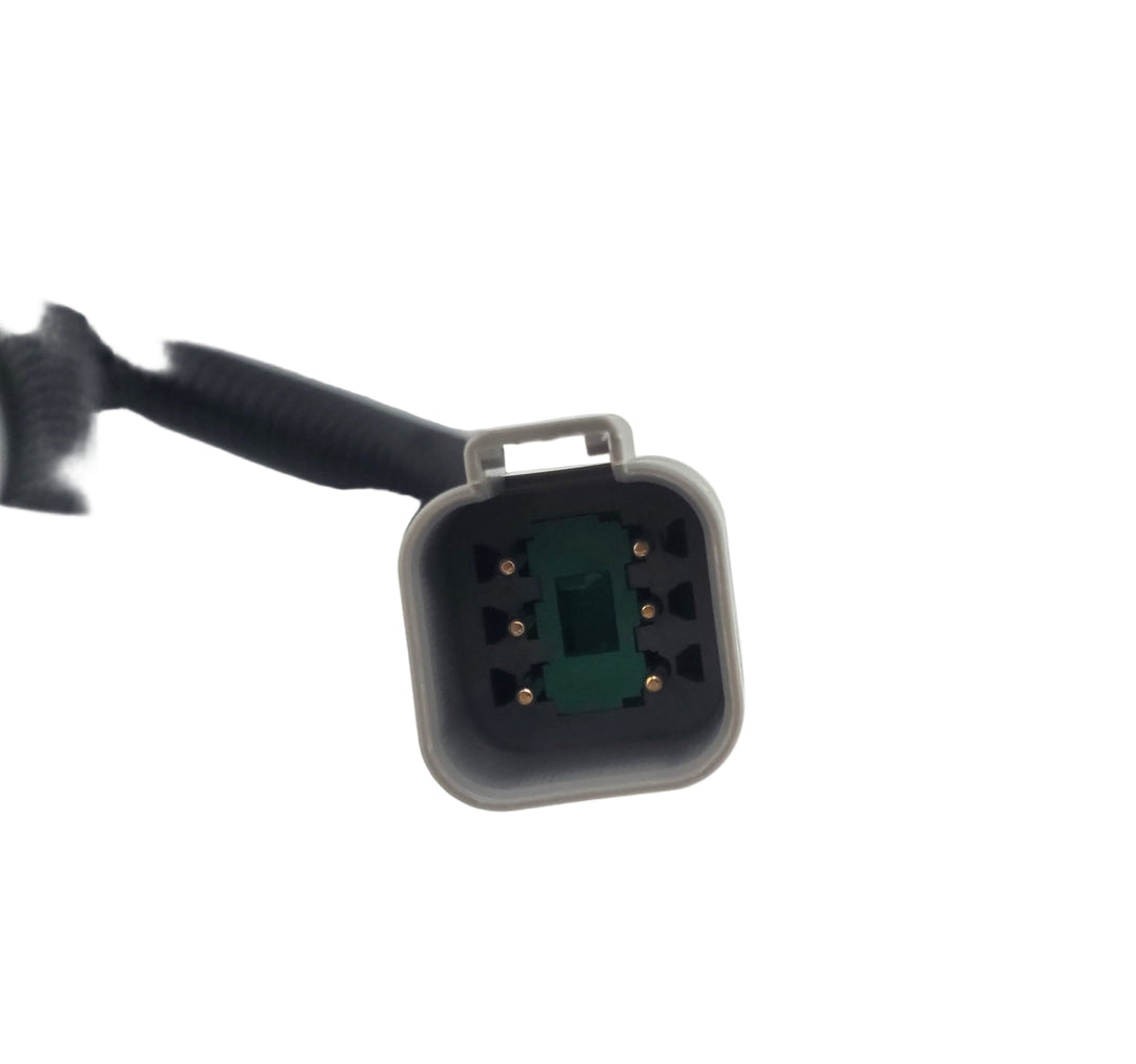 Advance Truck Parts USA branded close-up studio perspective highlighting the internal 6-pin connector block, green seal, and metal contact pins of the heavy-duty engine wiring harness
