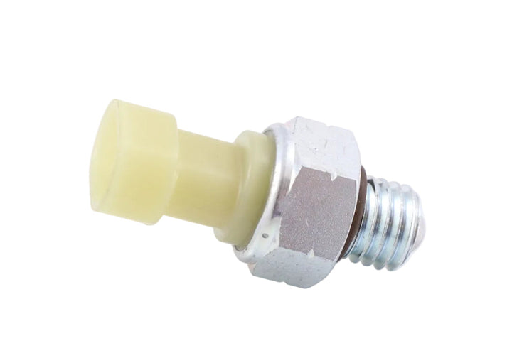 Advance Truck Parts USA BA29200 reverse switch showing a clean studio view of the cream plastic housing, metallic hex fitting, and threaded tip 